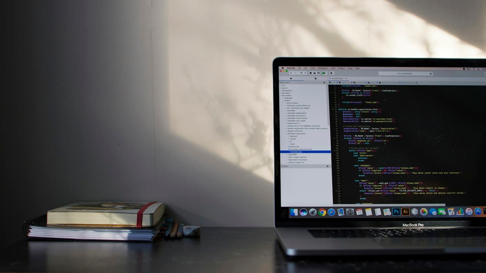 A laptop screen showing lines of code in an editor