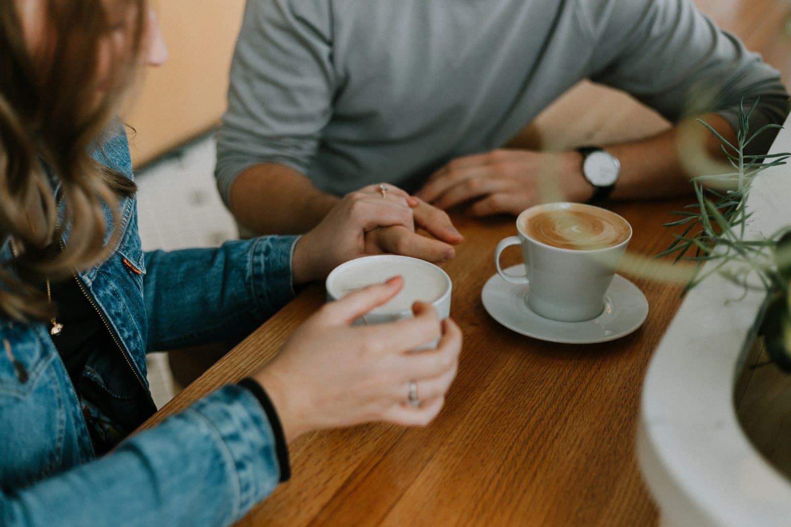 Two mugs of coffee on a table